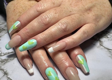 Elegant nail design at Dollhaven Co in Walmsley, Western Australia, AU with mint green and heart details.