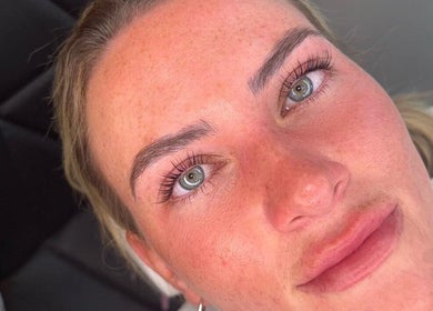 Client with radiant skin at The Glow Room, Armthorpe, England, GB after beauty treatment.