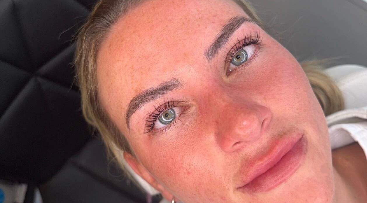 Client with radiant skin at The Glow Room, Armthorpe, England, GB after beauty treatment.