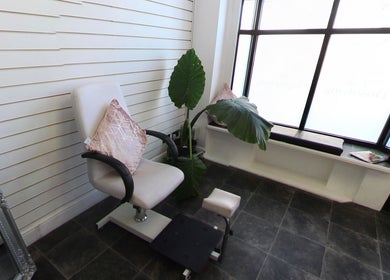 Comfortable chair and greenery at Sophie At Beauty Haven, March, England, GB.