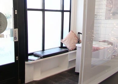 Bright seating area at Sophie At Beauty Haven, March, England, GB, featuring a window seat with a soft cushion.