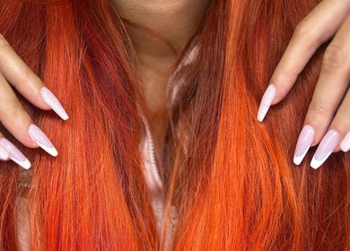 Elegant nail art contrasting beautifully with vibrant red hair at La - Fabulous in Boksburg, Gauteng, ZA.