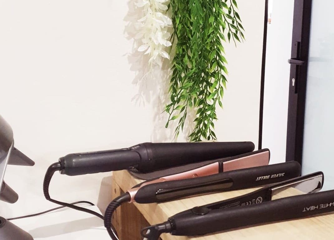 Elegant hair styling tools displayed at Ravaina Rain Studio, Cape Town, Western Cape, ZA.