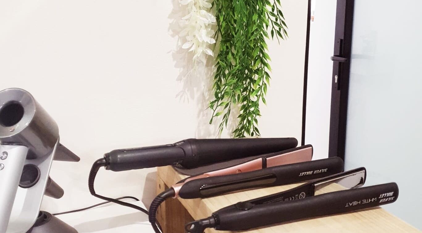 Elegant hair styling tools displayed at Ravaina Rain Studio, Cape Town, Western Cape, ZA.