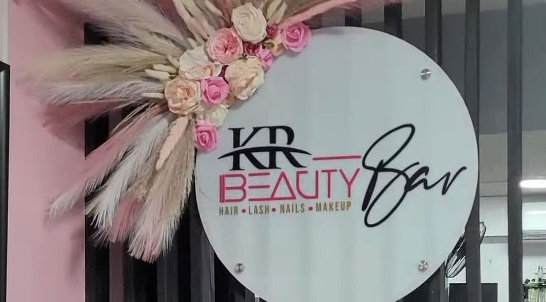 Elegant KR Beauty Bar sign with floral decor in Kingston, St. Andrew Parish, JM.