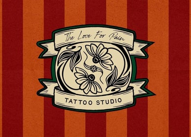 Tattoo studio logo with floral design at The Gentlemen's Lounge, Bodmin, England, GB.