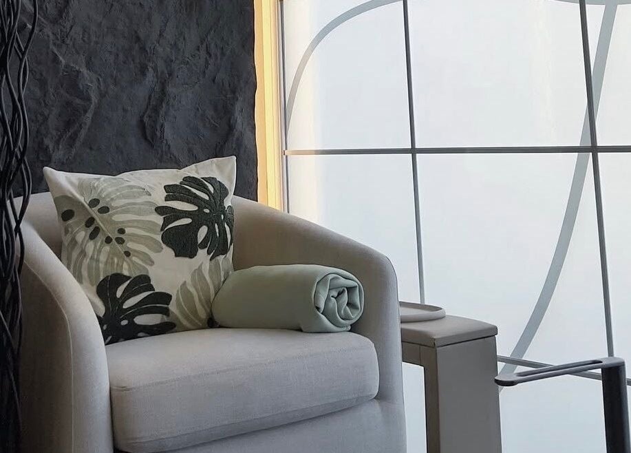 Cozy seating at Hugs Beauty Salon in Muscat, Muscat Governorate, OM with elegant decor and soft lighting.