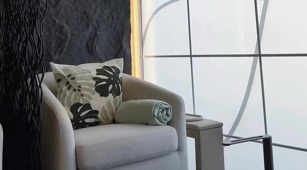 Cozy seating at Hugs Beauty Salon in Muscat, Muscat Governorate, OM with elegant decor and soft lighting.