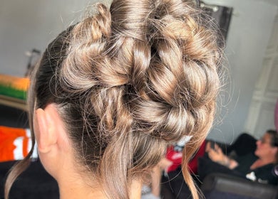 Intricate updo hairstyle by Hair Up by Em in Birmingham, England, GB, showcasing detailed braiding.