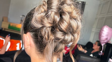 Intricate updo hairstyle by Hair Up by Em in Birmingham, England, GB, showcasing detailed braiding.