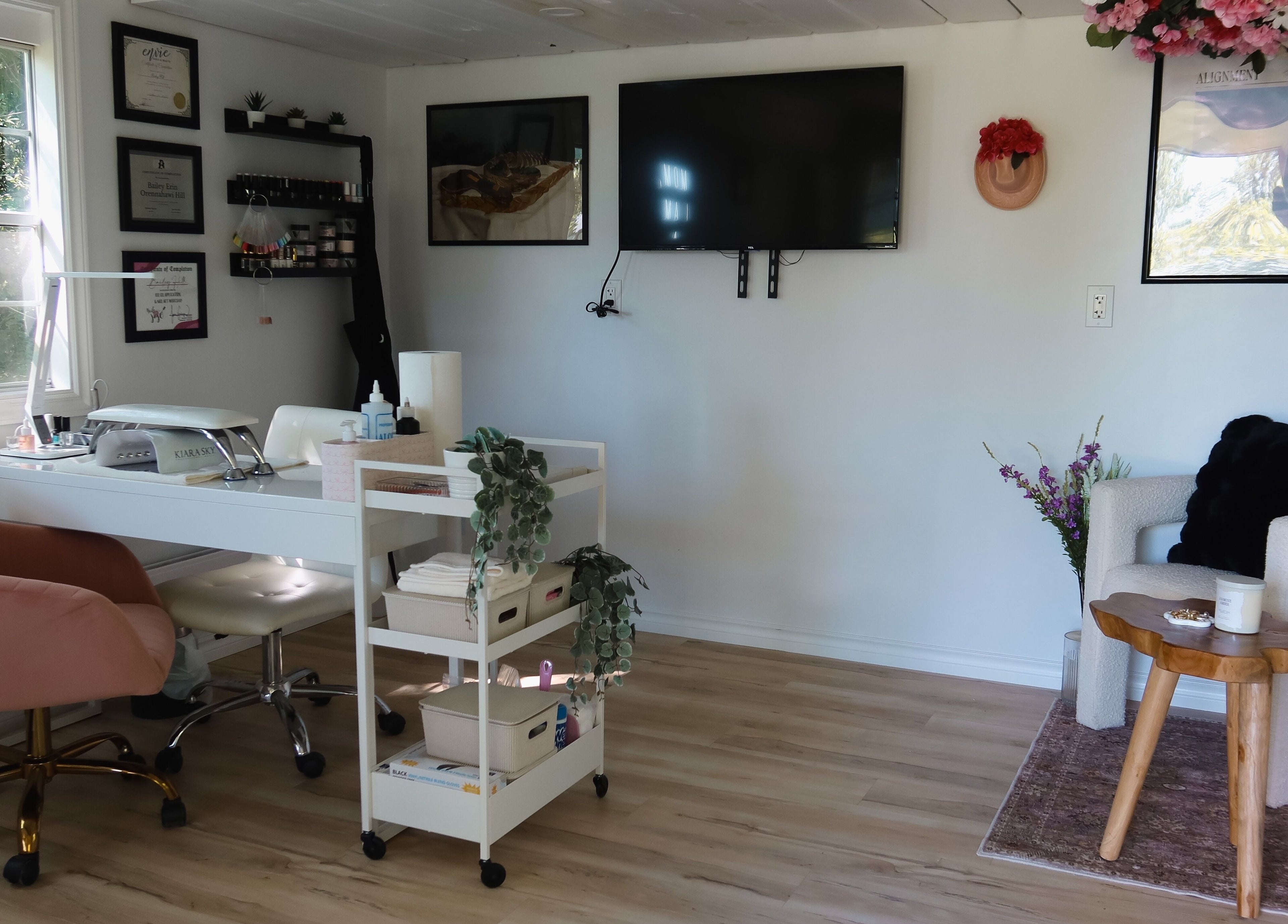 Chic interior of Yorá:se Nails & Beauty in Brant, Ontario, CA featuring cozy seating and stylish decor.