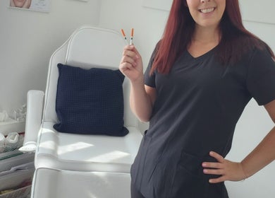 Emma Johnstone at The Makeup Parlour 118 Abbeywood in Skelmersdale, England, showcasing tools in a serene setting.