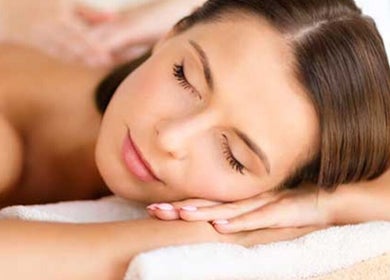 Woman enjoying a relaxing massage at Nudsara Massage, Lyndhurst, England, GB.