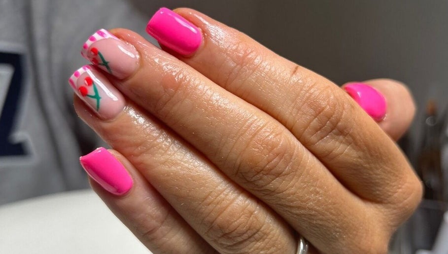 Chic pink nail art with floral design at Nails & Brows by Donna, Newcastle, Northern Ireland, GB.