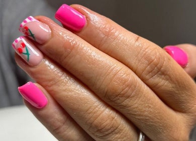 Chic pink nail art with floral design at Nails & Brows by Donna, Newcastle, Northern Ireland, GB.