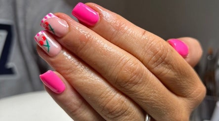 Chic pink nail art with floral design at Nails & Brows by Donna, Newcastle, Northern Ireland, GB.