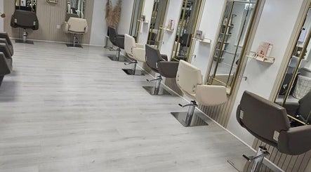 Elegant salon chairs at MorganJane Hair in Farnworth, England, GB offer a luxurious hair styling experience.