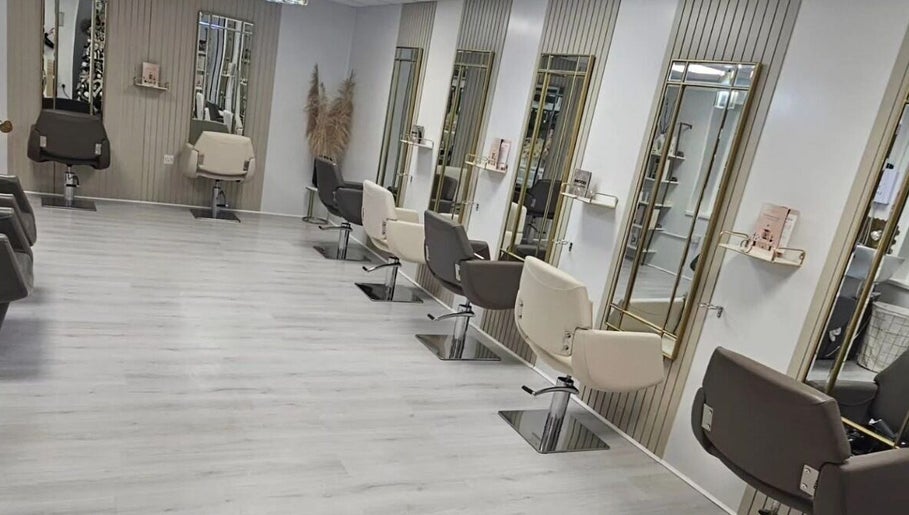 Modern styling chairs at Morgan Jane Hair in Farnworth, England, GB, showcasing luxury salon interiors.