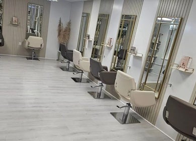 Modern styling chairs at Morgan Jane Hair in Farnworth, England, GB, showcasing luxury salon interiors.