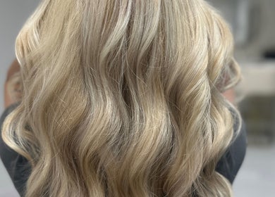 Blonde wavy hair styled at Morgan Jane Hair in Farnworth, England, GB.