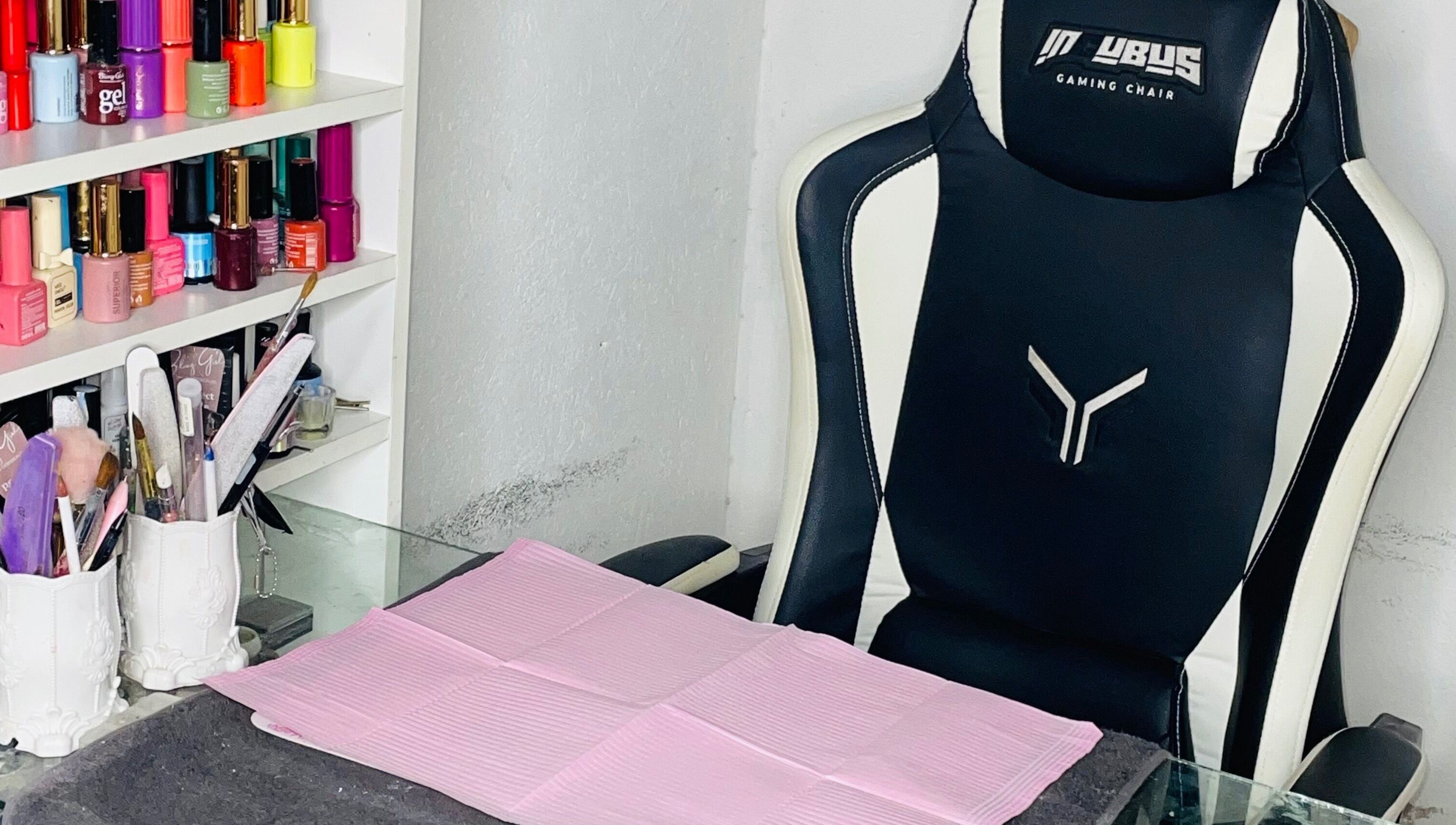 Modern manicure setup at Dee's Beauty Studio21 in Pretoria, Gauteng, ZA with nail polishes and tools.