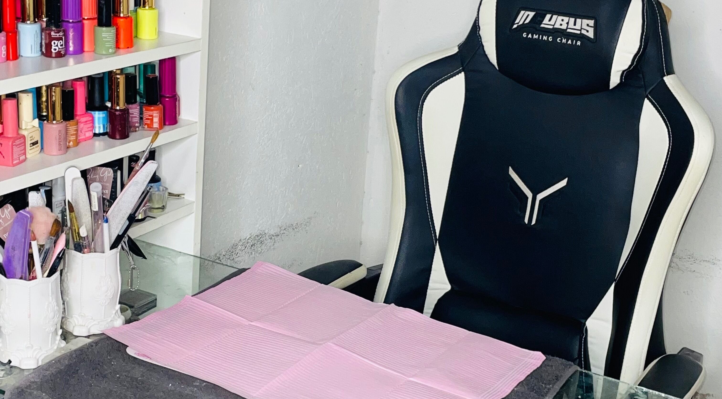 Modern manicure setup at Dee's Beauty Studio21 in Pretoria, Gauteng, ZA with nail polishes and tools.