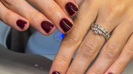 Rich burgundy manicure at Claws By Kate, Knowle, England, GB. Perfectly polished nails with a touch of elegance.