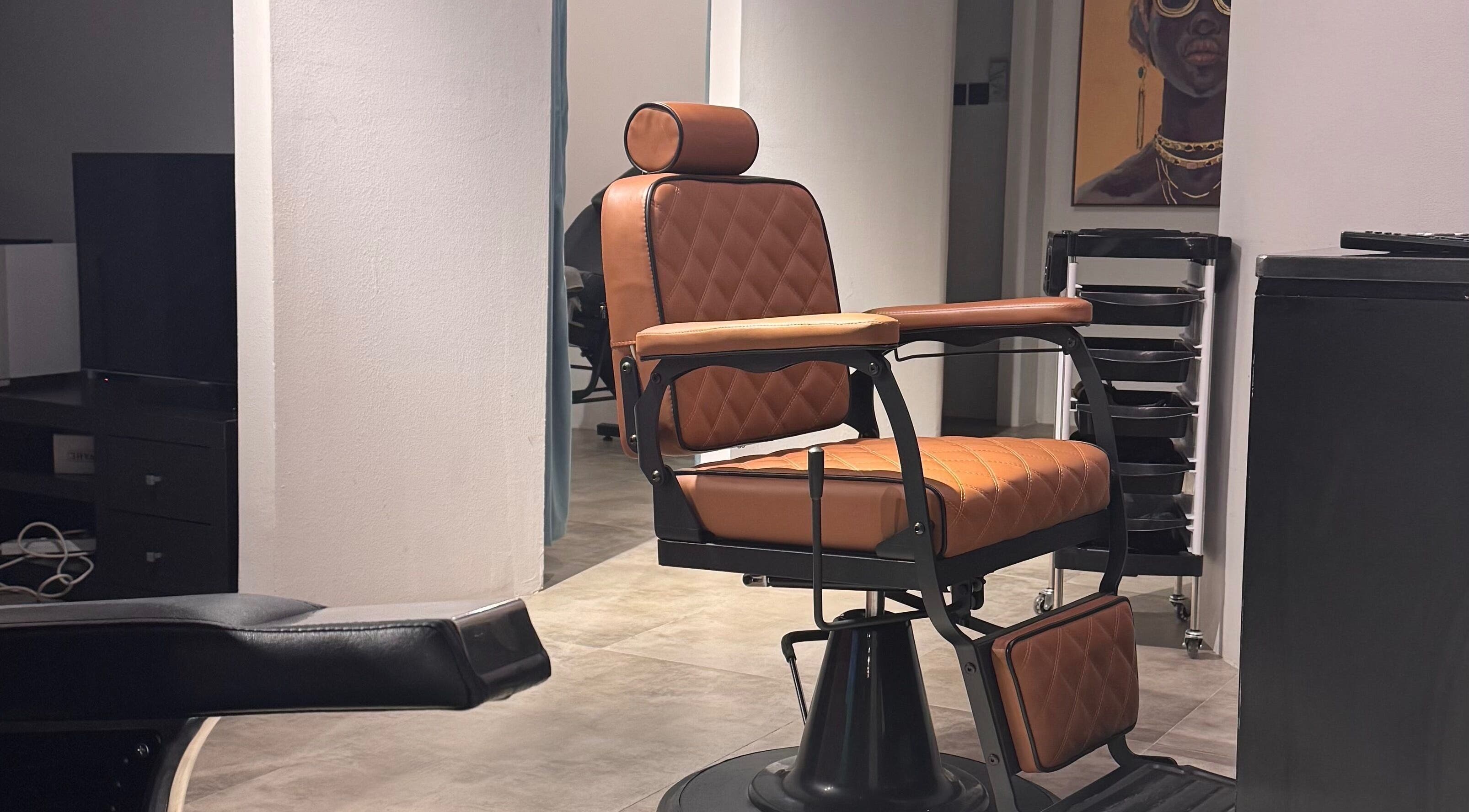 Elegant barber chair at Mr Boombastic, Sib, Muscat Governorate, OM showcasing style and comfort.