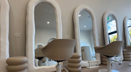 Modern salon mirrors and chic chairs at Hair Artistry By Catalina, Mentone, Victoria, AU.