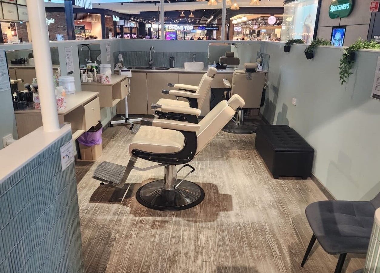 Elegant salon interior at Love Eyebrows Blackburn, Melbourne, Victoria, AU with plush seats and styling stations.
