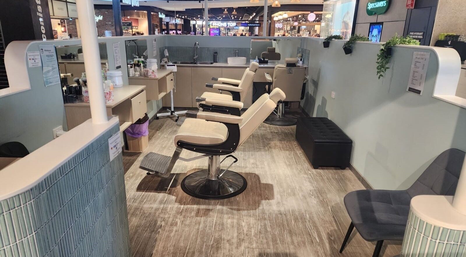 Elegant salon interior at Love Eyebrows Blackburn, Melbourne, Victoria, AU with plush seats and styling stations.