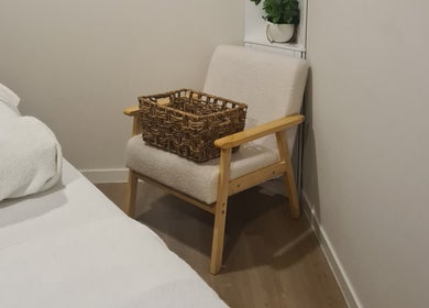Cozy corner with chair and basket at Rare Earth Beauty, Kingscliff, New South Wales, AU.