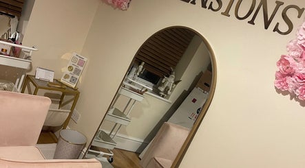 Luxury interior of DBextensions beauty salon, Waltham Cross, England, GB featuring chic decor and large mirror.