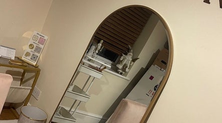 DBextensions salon corner with a stylish mirror and decor, showcasing elegance in Waltham Cross, England, GB.