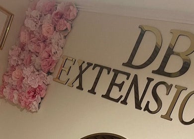 Pearl Elegance wall with pink floral decor and certificates in Waltham Cross, England, GB.