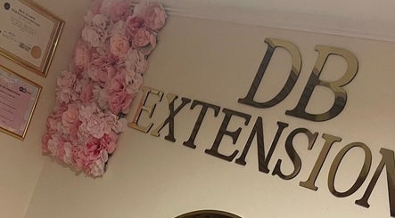 Pearl Elegance wall with pink floral decor and certificates in Waltham Cross, England, GB.