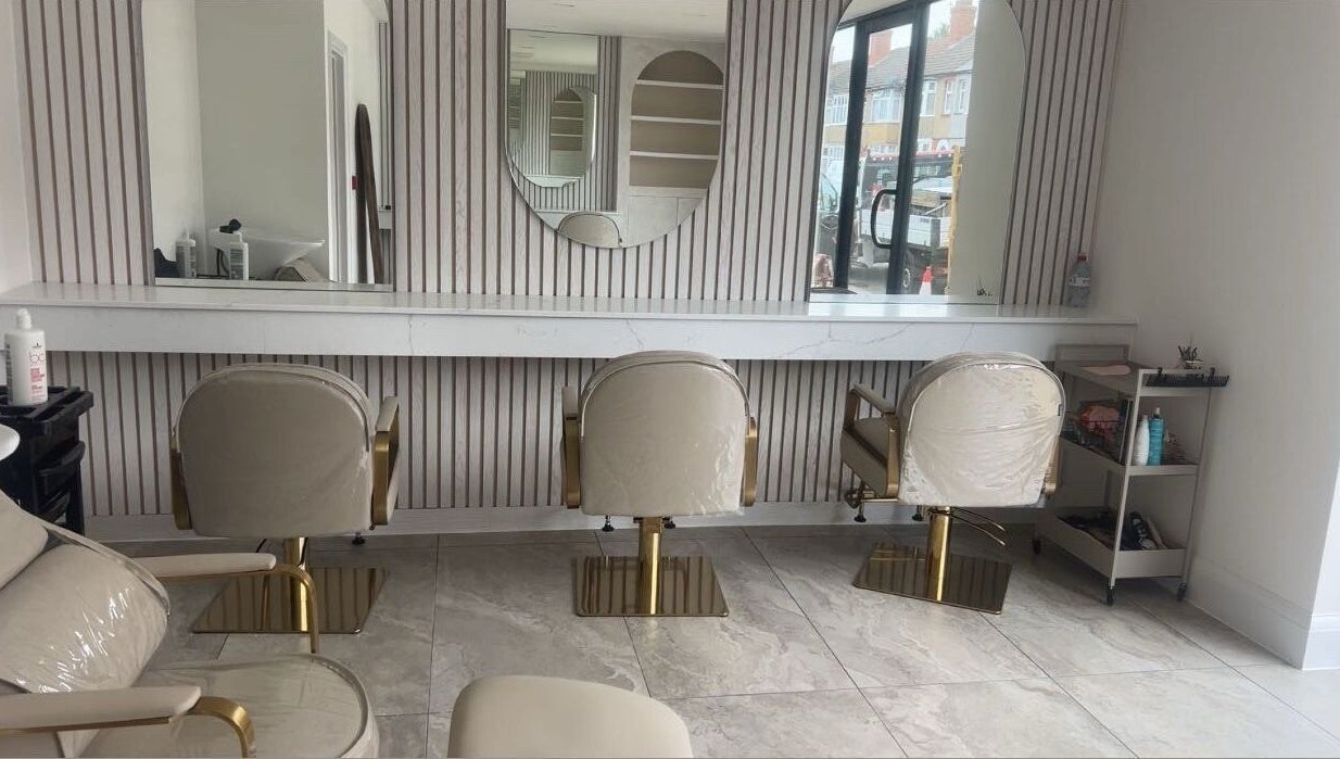 Elegant salon chairs and mirrors at Glossed by Olivia, Northampton, England, GB.