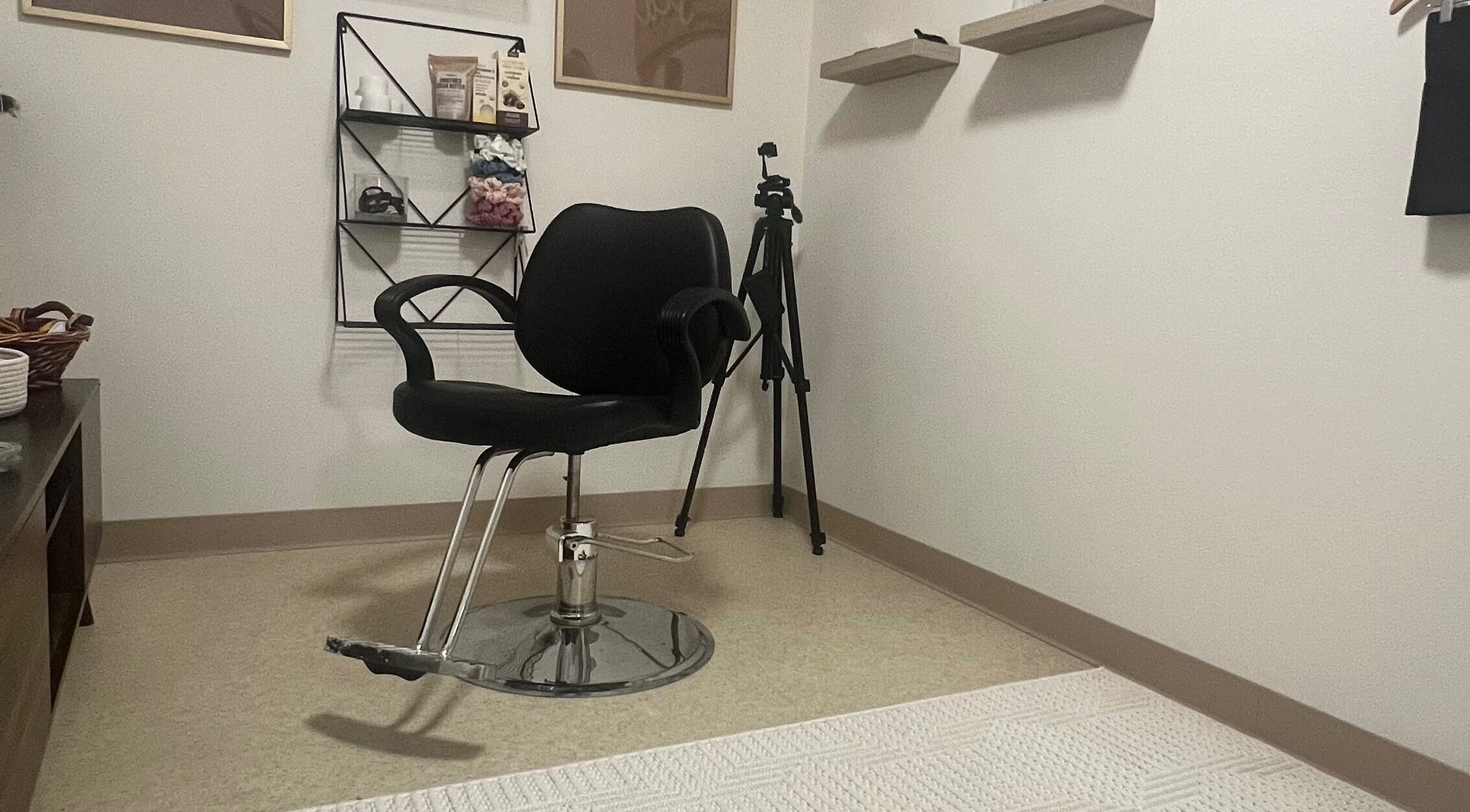 Modern salon chair in Locs By KeAirya Gynene, JBER, Alaska, US elegantly set in a chic, minimalistic space.