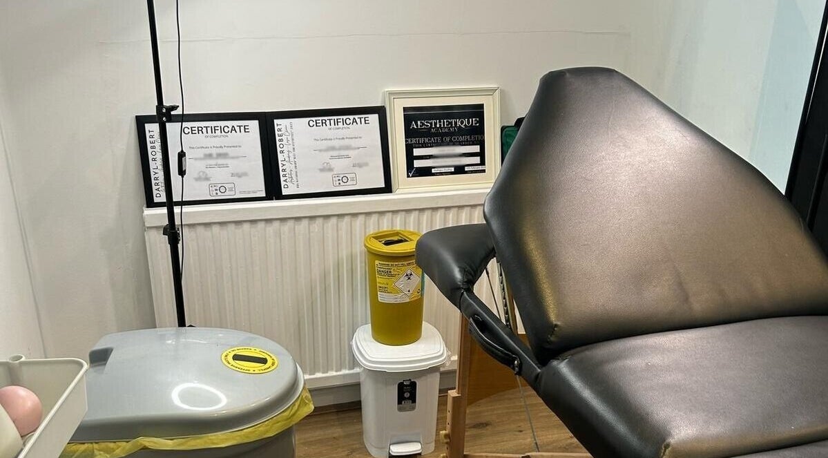 Professional treatment room at Ara Aesthetics (Home Services Available), Edgware, England, GB highlighting equipment and certifications.