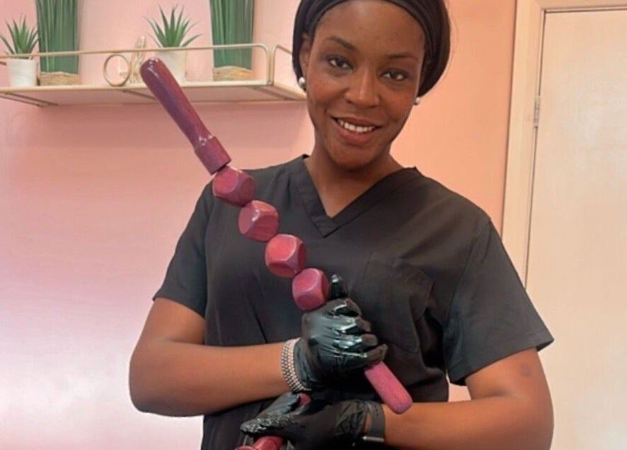 Aesthetic professional at Ara Aesthetics (Home Services Available), Edgware, England, GB, holding a massage tool.