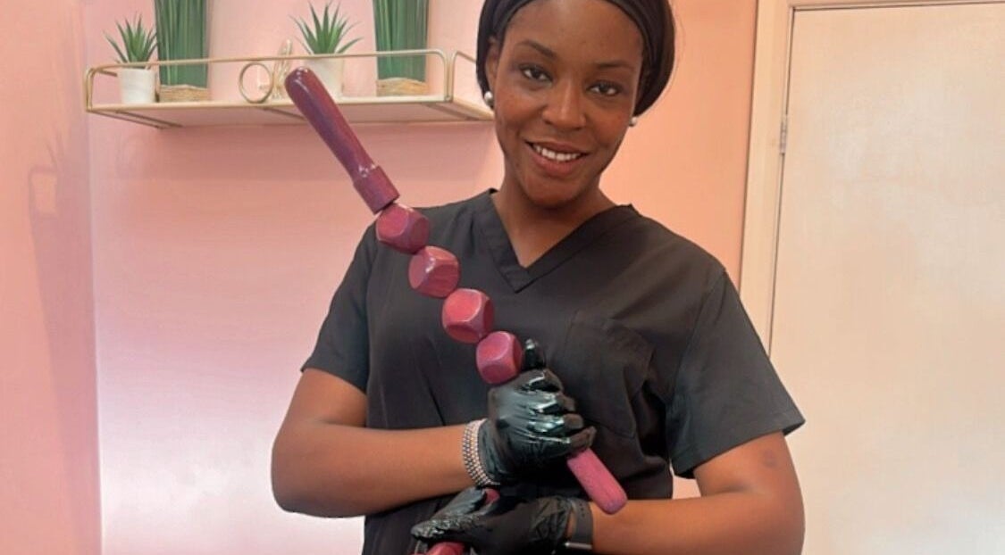 Aesthetic professional at Ara Aesthetics (Home Services Available), Edgware, England, GB, holding a massage tool.
