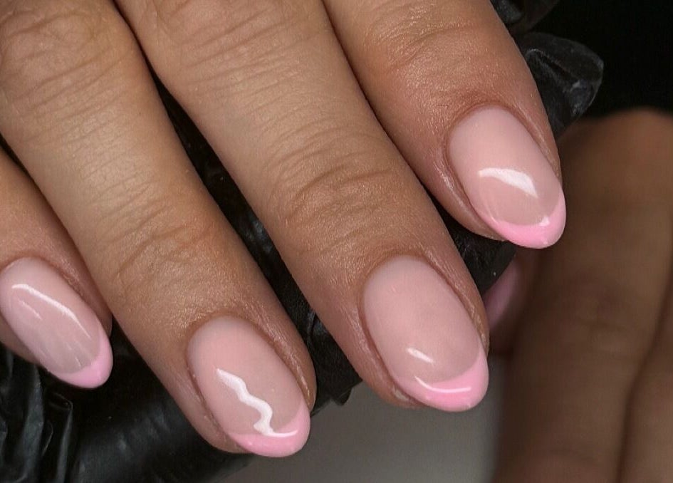 Elegant pink manicure at bymiaxglover, Lowestoft, England, GB. Perfect nail care for a sophisticated look.