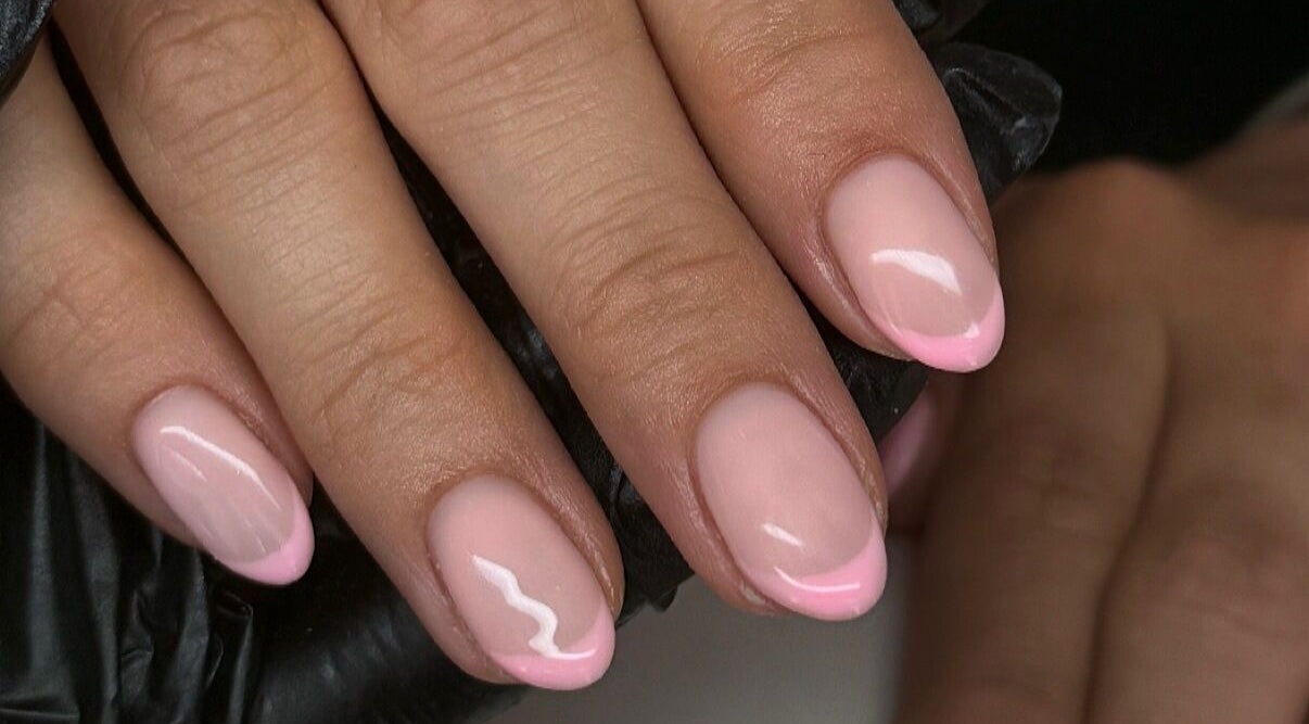 Elegant pink manicure at bymiaxglover, Lowestoft, England, GB. Perfect nail care for a sophisticated look.