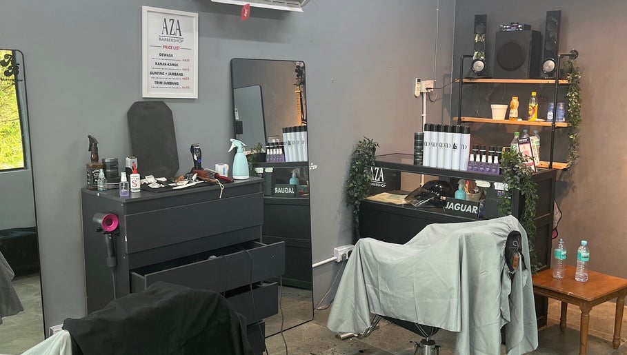 Modern barber styling area at One2k.Barber, Kepala Batas, Kedah, MY showcasing sleek design and tools.