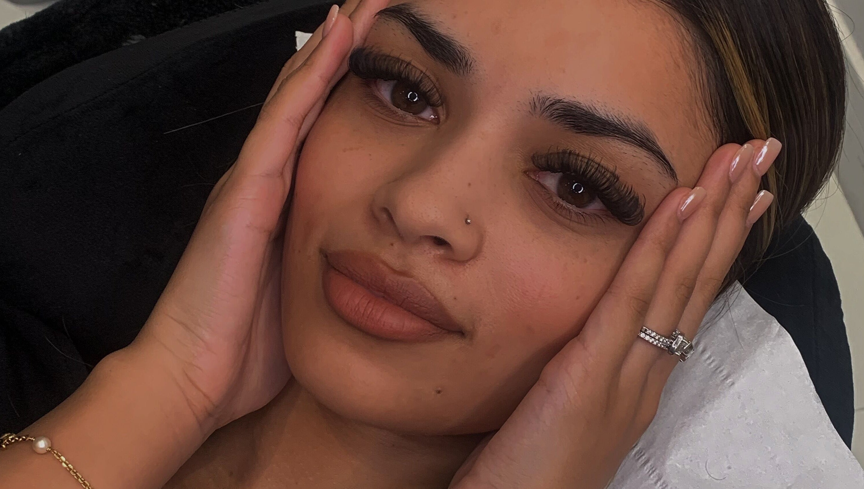 Close-up of a client's face with lush lashes at beauty by imy, Portsmouth, England, GB.