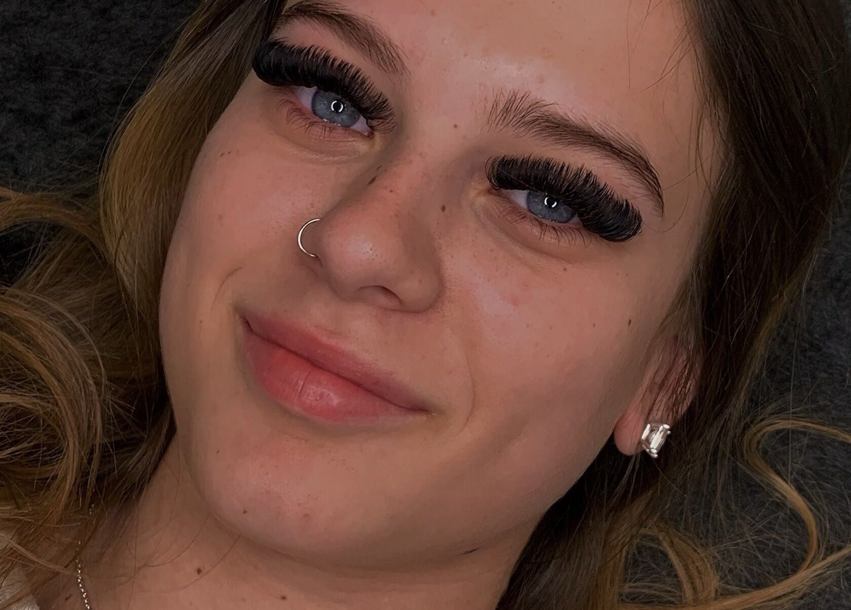 Close-up of woman with stunning eyelash extensions at beauty by imy, Portsmouth, England, GB.