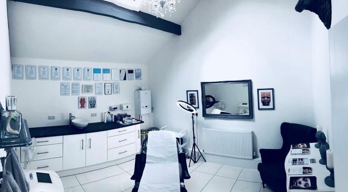 Modern treatment room at Sam Major Aesthetics, Harrogate, England, GB showcasing a sleek and professional setup.