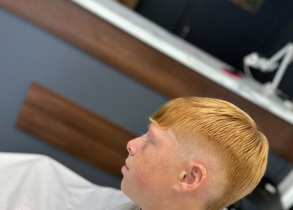 A modern haircut at Nando 23 Cuts, Swords, County Dublin, IE, showcasing expert styling.