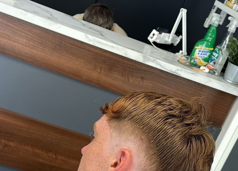 Stylish haircut at Nando 23 Cuts, Swords, County Dublin, IE showcasing modern barber techniques.