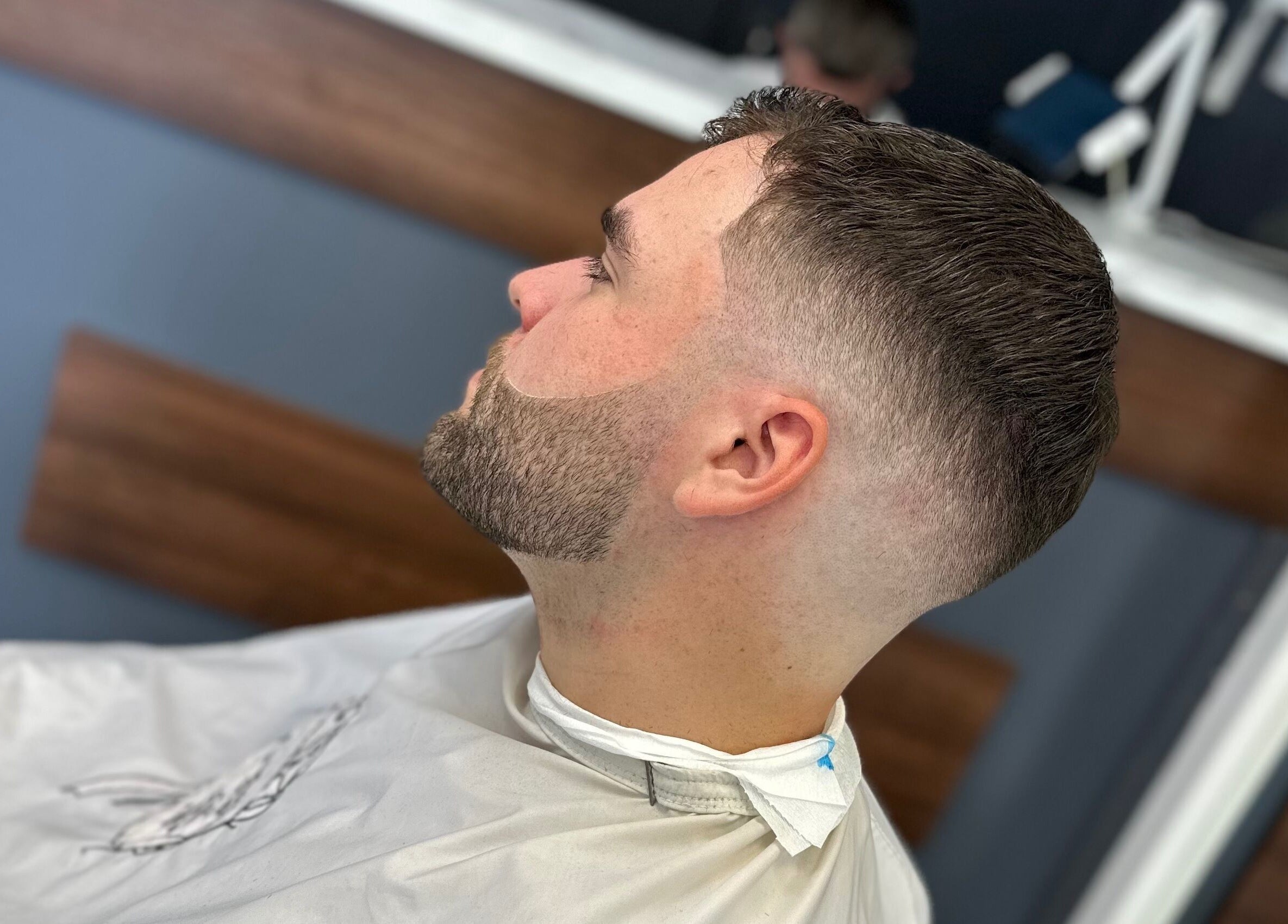 Modern hairstyle at Nando 23 Cuts, Swords, County Dublin, IE. Expertly groomed beard and fade cut.